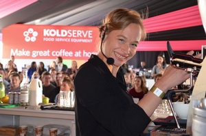 Esther Maasdam (Holland) competes in a latte art mystery challenge.