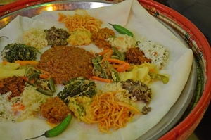No knives and forks allowed. The injera acts as both plate and utensils to scoop up the colourful array of delicious delicacies. We opted for the vegetarian platter.